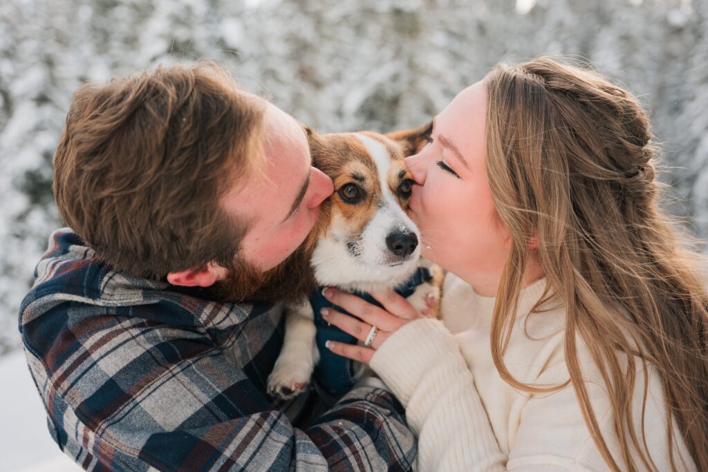 Couple with their dog in a winter engagement session by Charles Moll