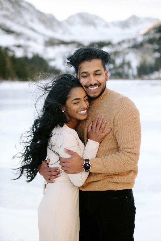 Snowy engagement portrait by Francis Sylvest