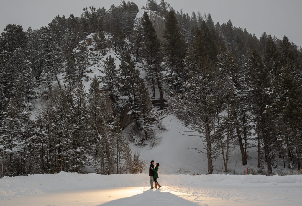 Snowy mountain engagement portrait by JCM Photography