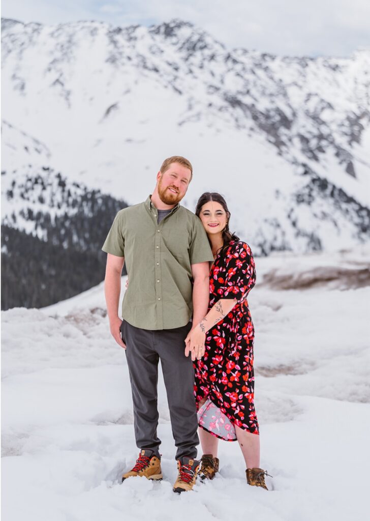 Snowy peak engagement portrait by Vows and Peaks