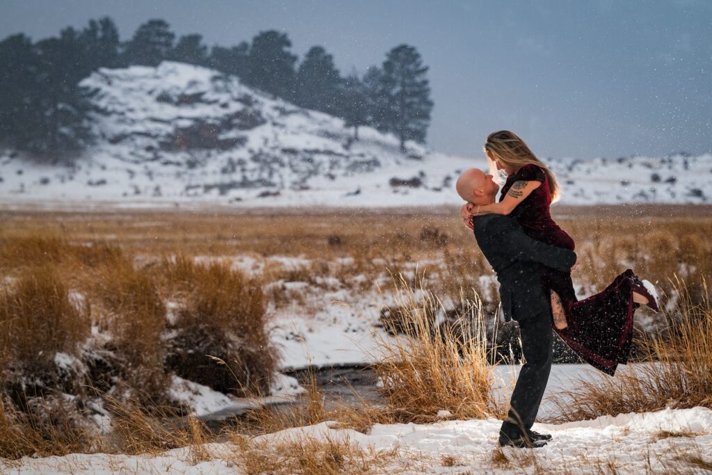 Playful winter engagement portrait by Gretchen Troop